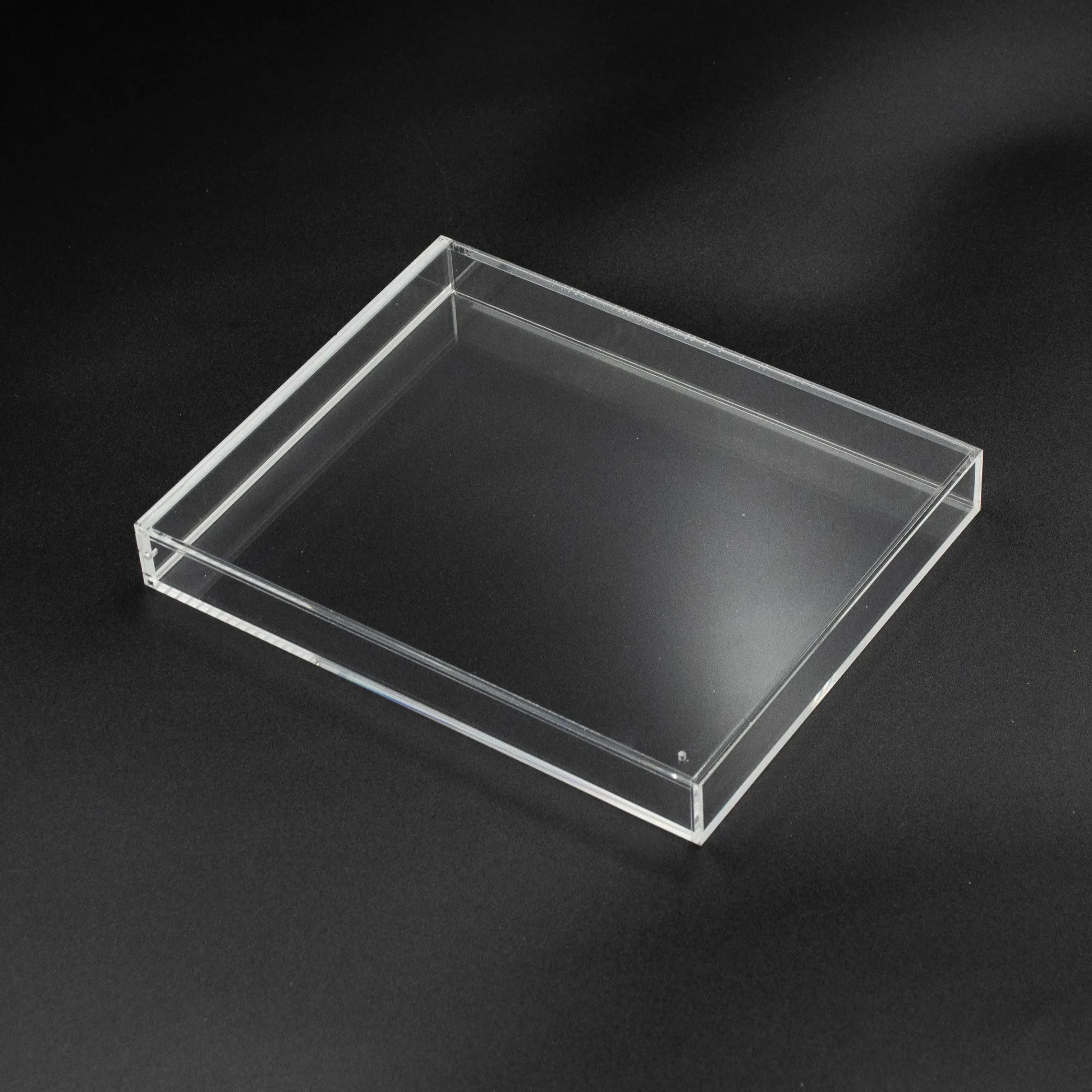 Vista superior de caja de metacrilato con cierre imantado para PS3, PS4 y PS5