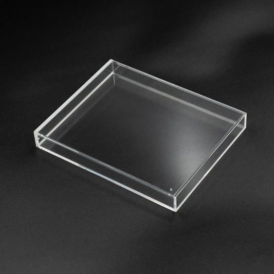 Vista superior de caja de metacrilato con cierre imantado para PS3, PS4 y PS5