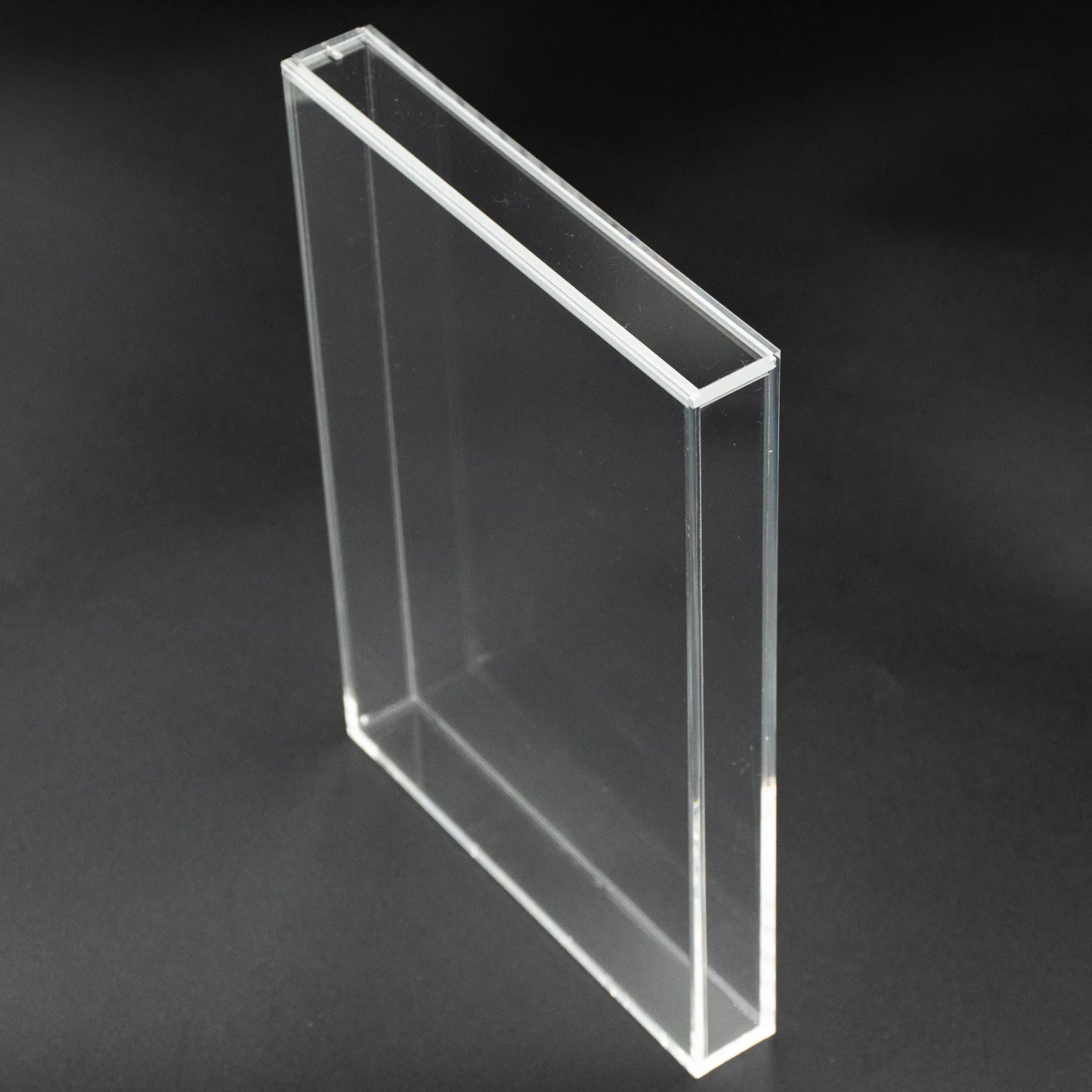 Vista lateral de caja de metacrilato de 3mm para videojuego de Nintendo Wii, ps2, gamecube o xbox 360