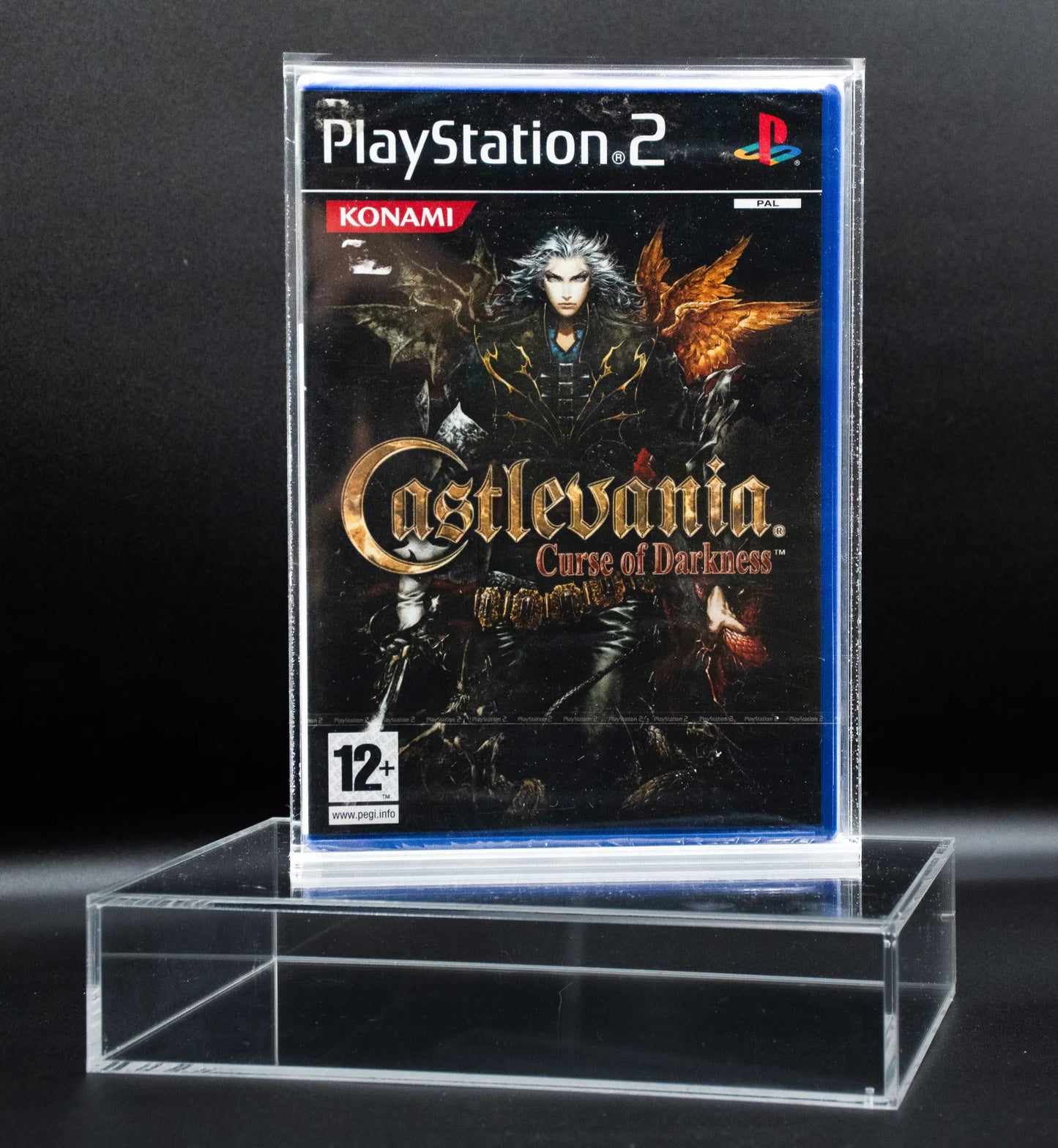 Caja de metacrilato con cierre imantado para ps2