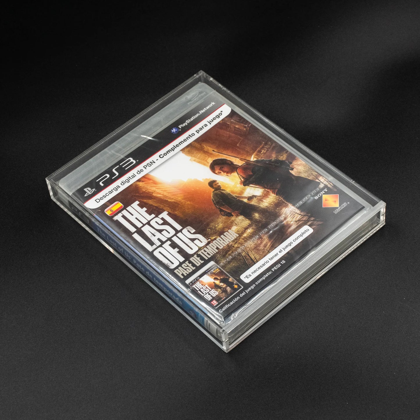 Vista superior de caja de metacrilato con cierre imantado para ps3