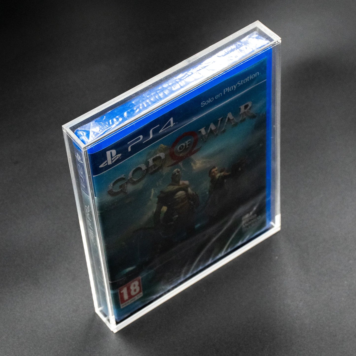 Vista lateral de caja de metacrilato con cierre imantado para ps4