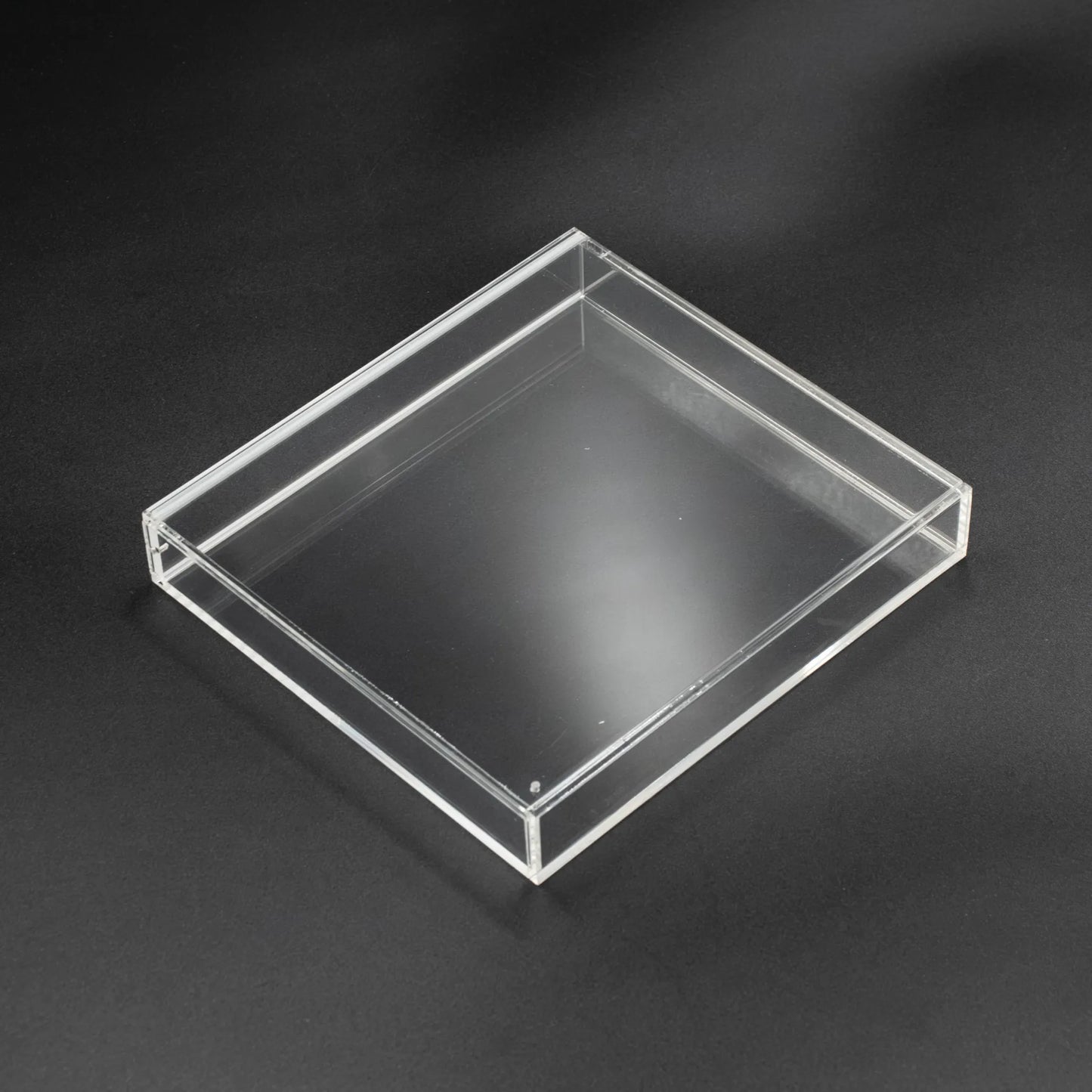 Vista superior de caja de metacrilato con cierre imantado para videojuego de Play Station 1