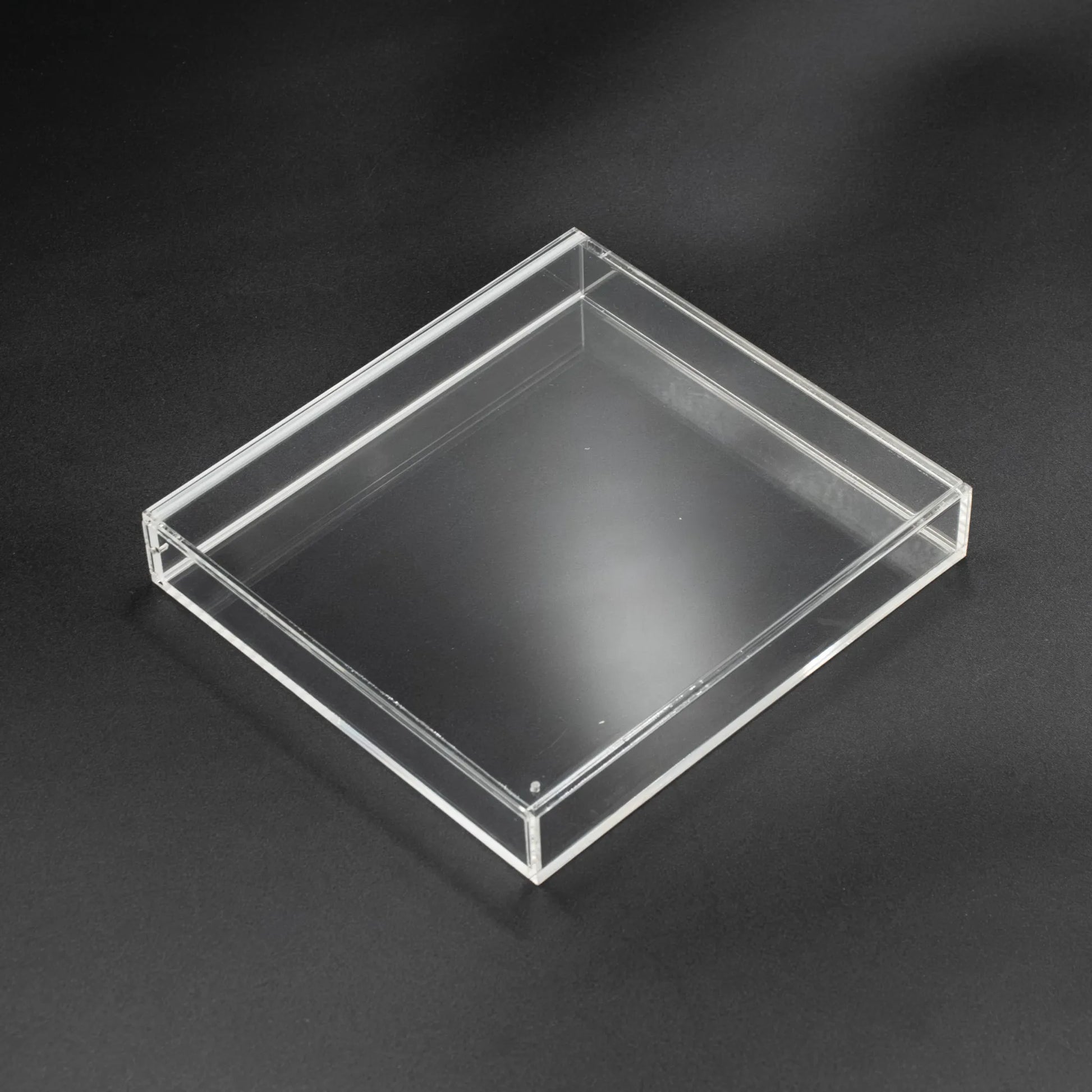 Vista superior de caja de metacrilato con cierre imantado para videojuego de Play Station 1