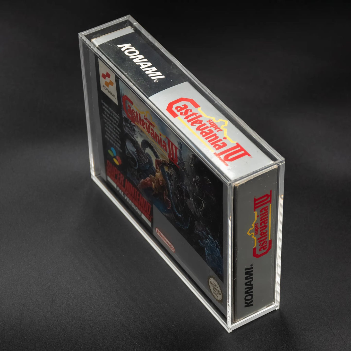 Vista lateral de caja protectora de metacrilato para Super Nintendo
