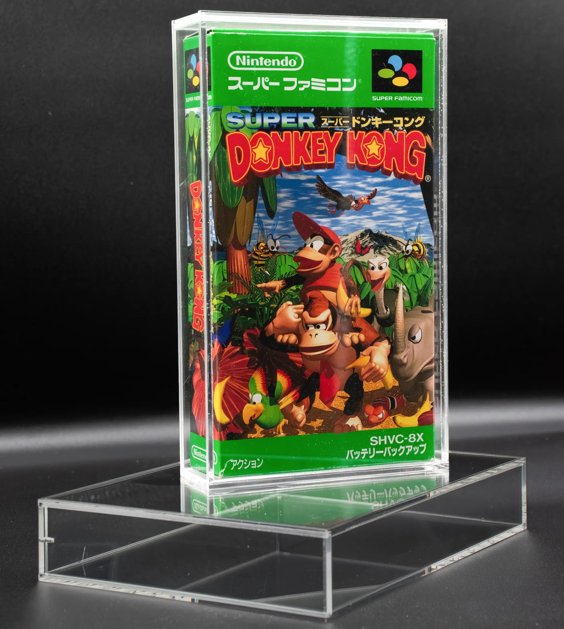 Caja de metacrilato para proteger videojuego de super famicom