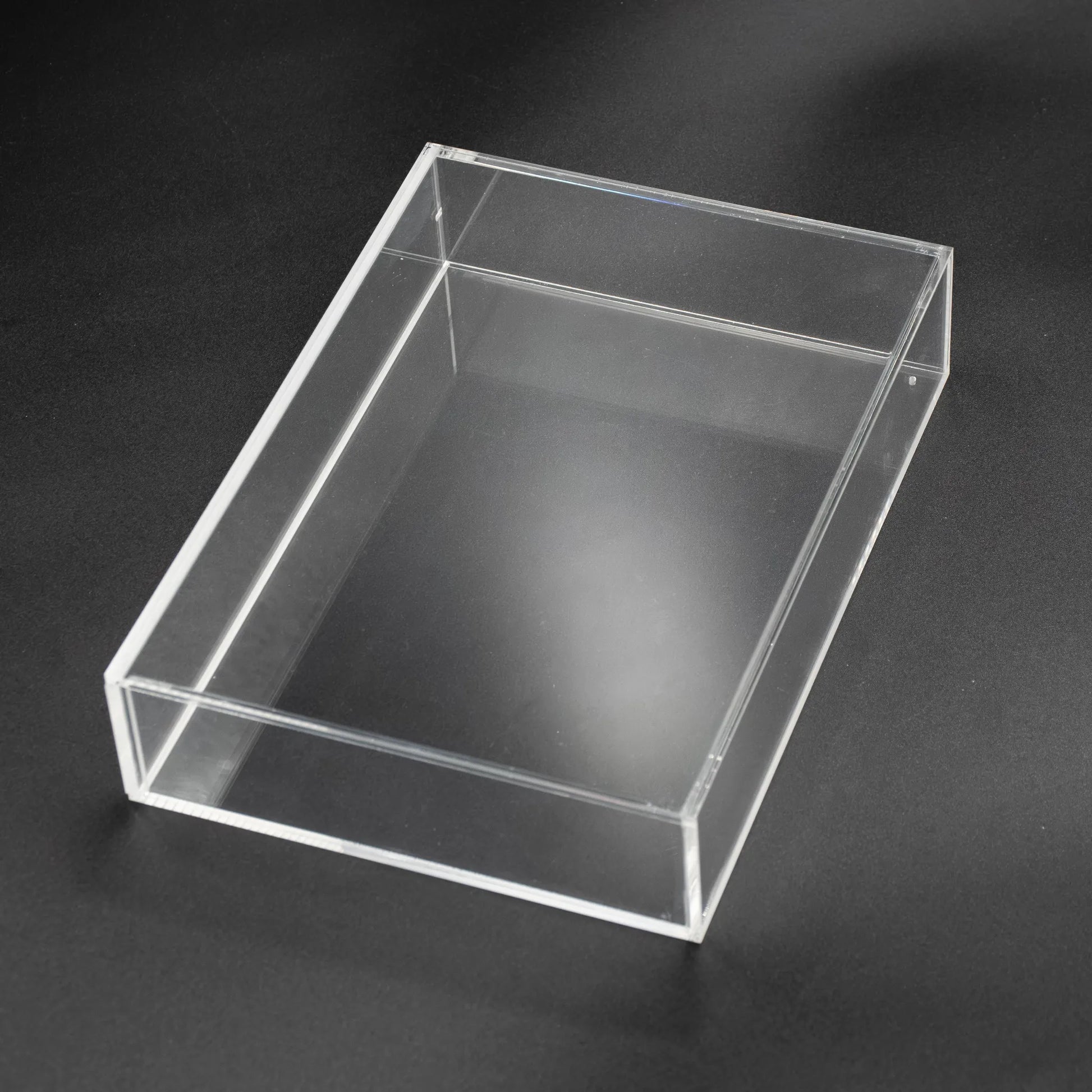 Vista superior de caja protectora de metacrilato para Nintendo 64 y Super Nintendo